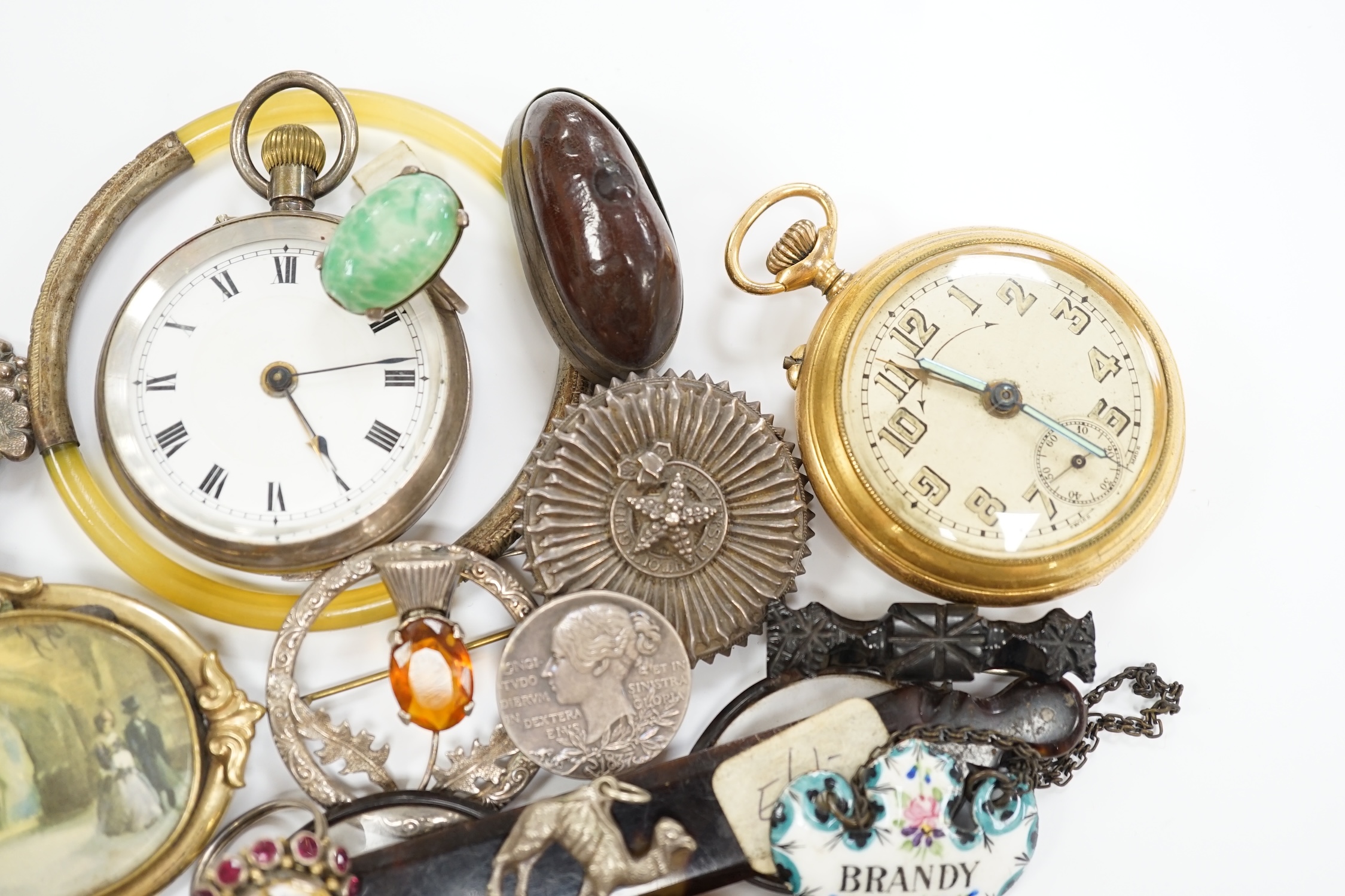 An interesting group of Victorian and later bijouterie, including mourning brooch, paste buckle, pocket watches, rings, wine label, etc.